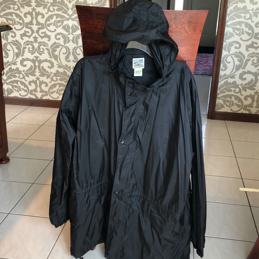 TravelSmith travel rain coat with hood.
